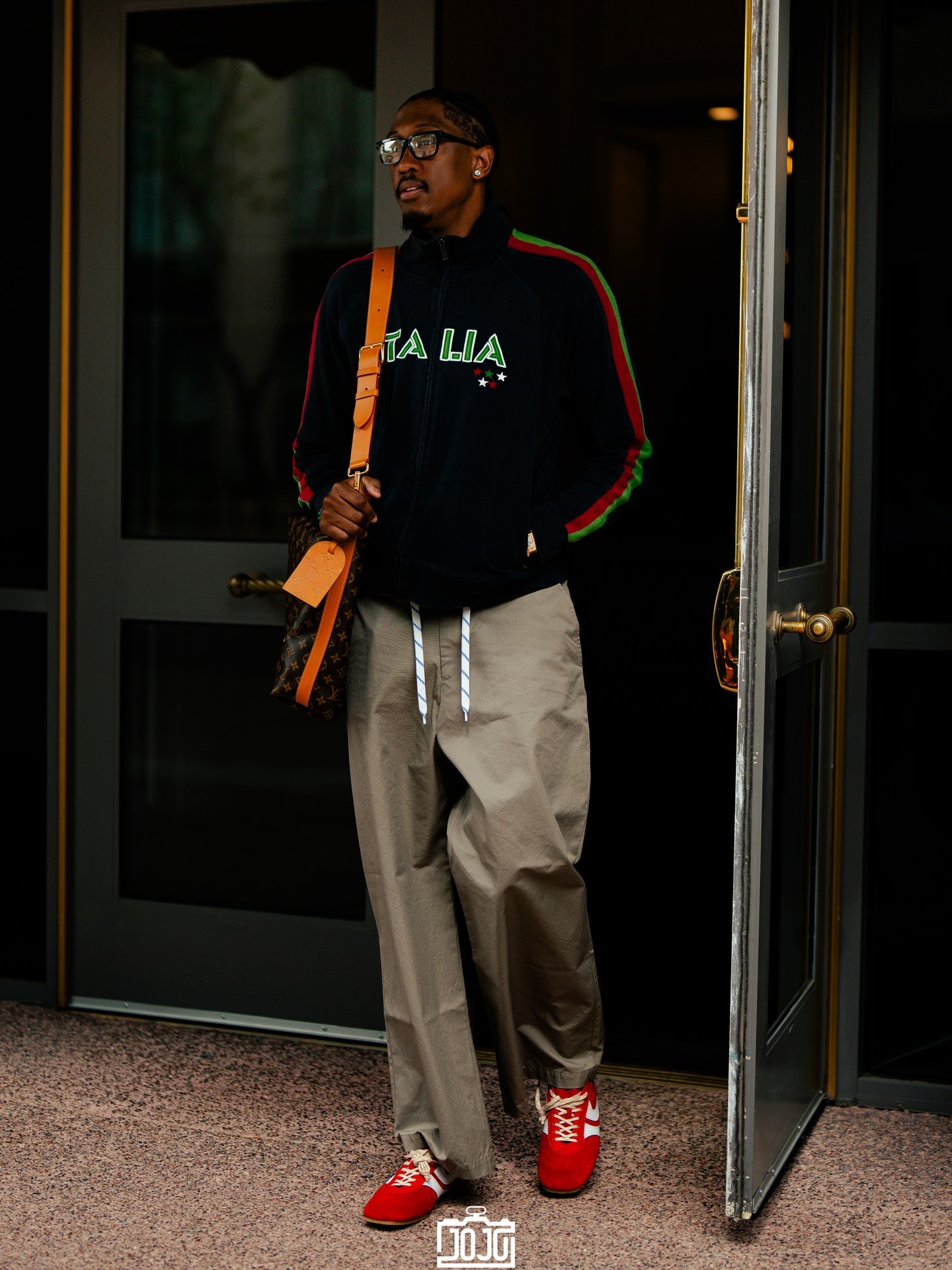 Jalen Williams wearing Rebalance Vintage Vintage Y2K Faded Black Italia Embroidered Zip Up Track Jacket (L/XL), Balenciaga Men’s Chino Pants in Beige.