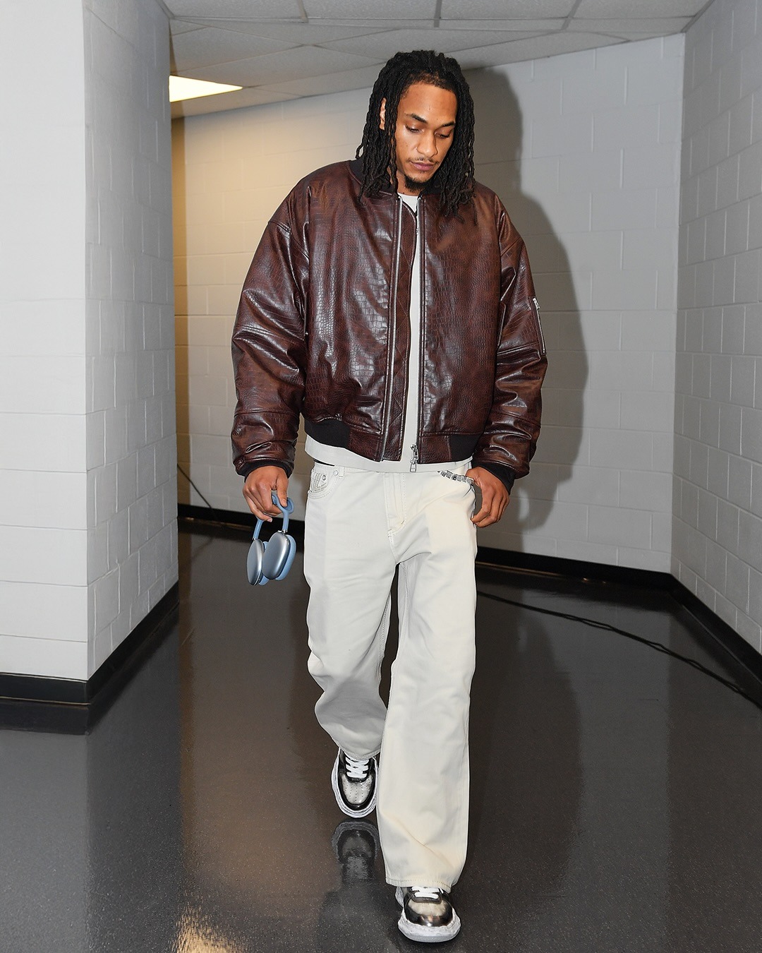 Devin Vassell wearing BREATH FAUX CROCODILE BOMBER JACKET / BRW, Officine Generale Vintage Original Wash Jeans in Ecru and MIHARA YASUHIRO MANNAHATTA NYC x.