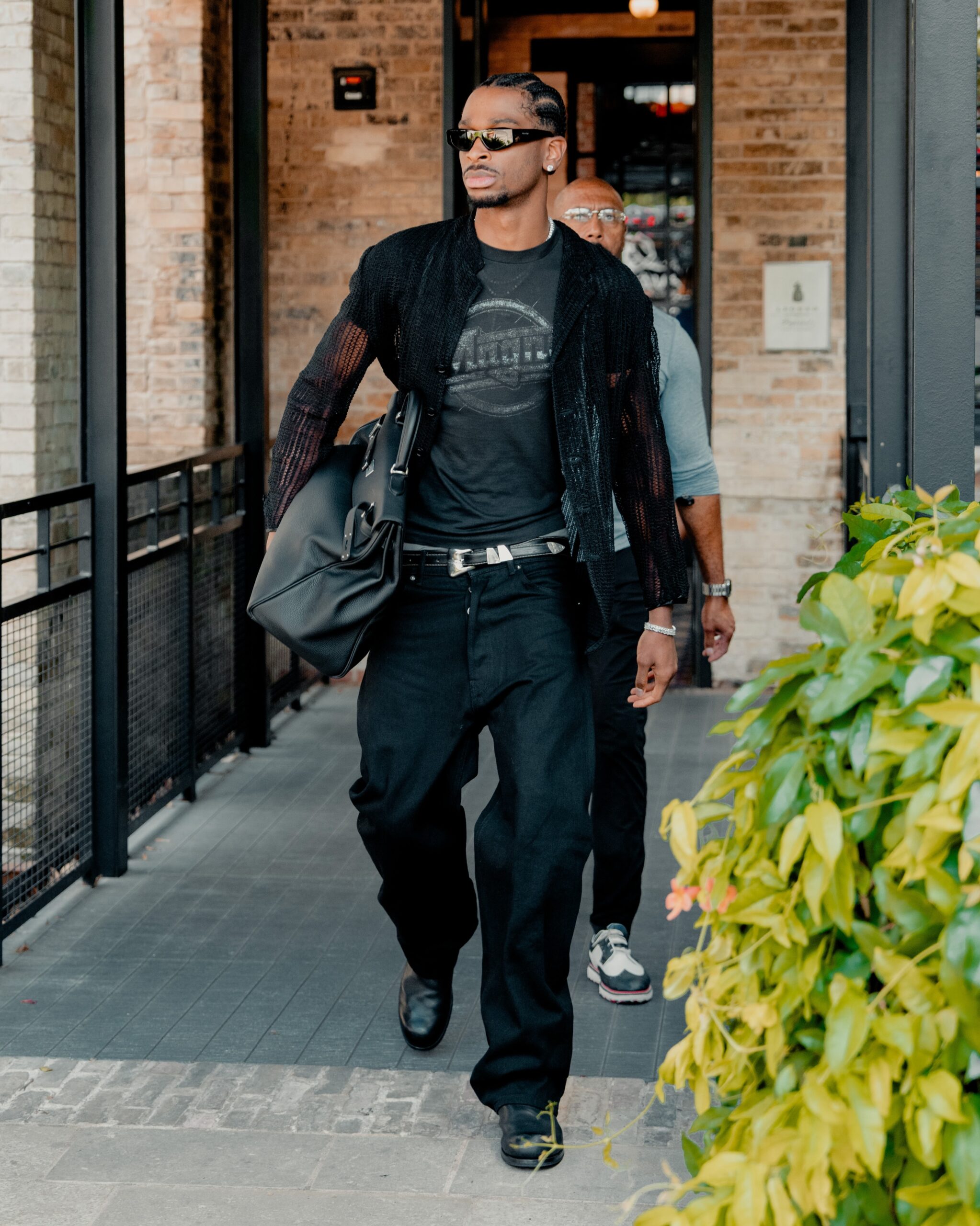 Shai Gilgeous Alexander wearing All Saints Sylvan Short Sleeve Shirt Jet Black, Marc Nolan Marc Nolan Leather Belt – Black Crocskin and Balenciaga.