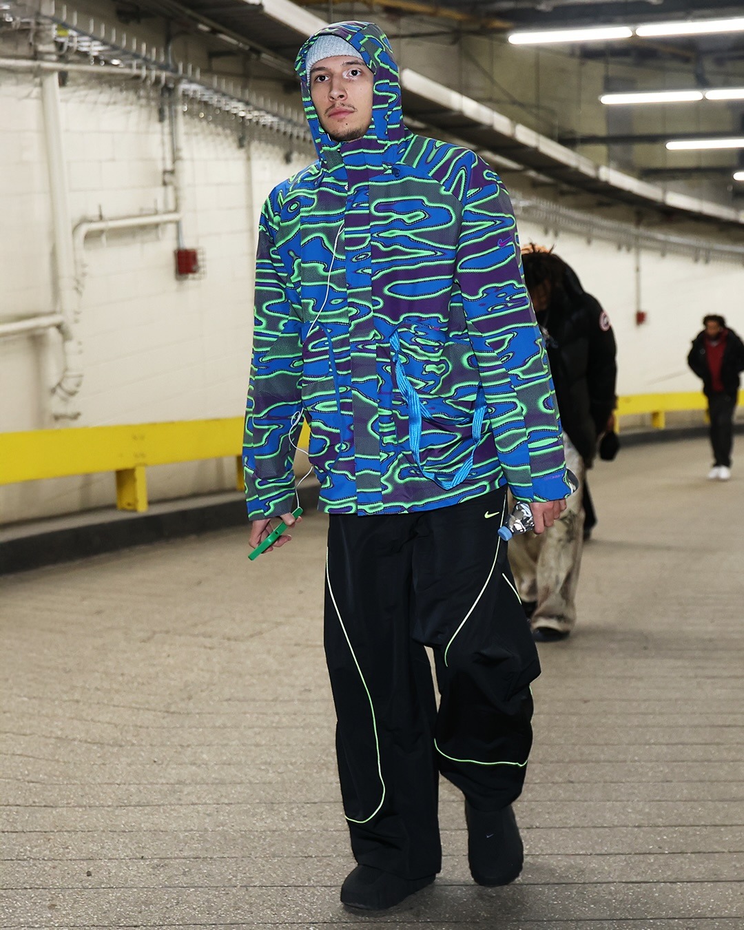 Lindy Waters III wearing Nike Nike project f.R.O.G. Men’s storm-fit hooded jacket, Nike Nike project f.R.O.G. Men’s tobi pants and Nike Black acg.