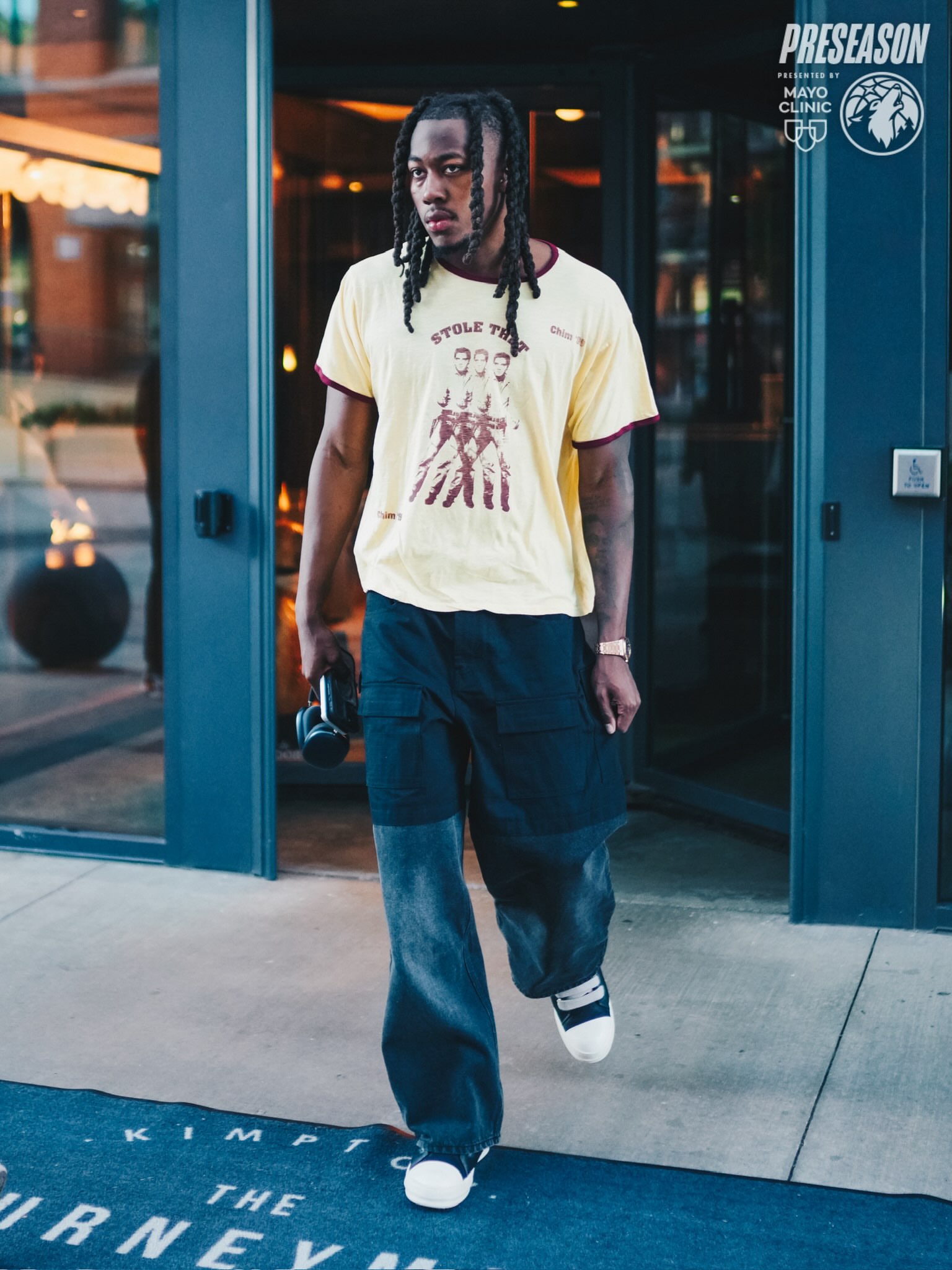 Jaden Ivey wearing Happy Memories Don’t Die Stole that tee, Bottega Desires Bottega desires cargo denim hybrid pants and Rick Owens JUMBOLACE ABSTRACT.